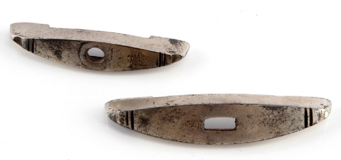 WWII GERMAN 3RD REICH WAFFEN SS DAGGER CROSS GUARD: Two cross guards from a Waffen SS dagger. The The top (distal) guard measures 2-7/8 inches wide by 1/4 inch tall by 9/16 inches deep. Tne inside of the top guard is marked with a "K" and a "D" on eith