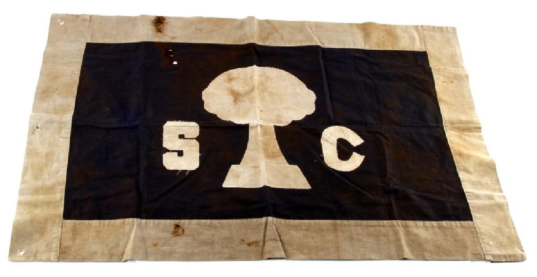 CIVIL WAR CONFEDERATE SOUTH CAROLINA BATTLE FLAG: A United States Civil War Confederate Battle Flag from South Carolina measuring 34-1/2 inches wide by 22-1/2 inches tall. he multi piece, single sided, machine sewn cotton flag shows a tree on the fro