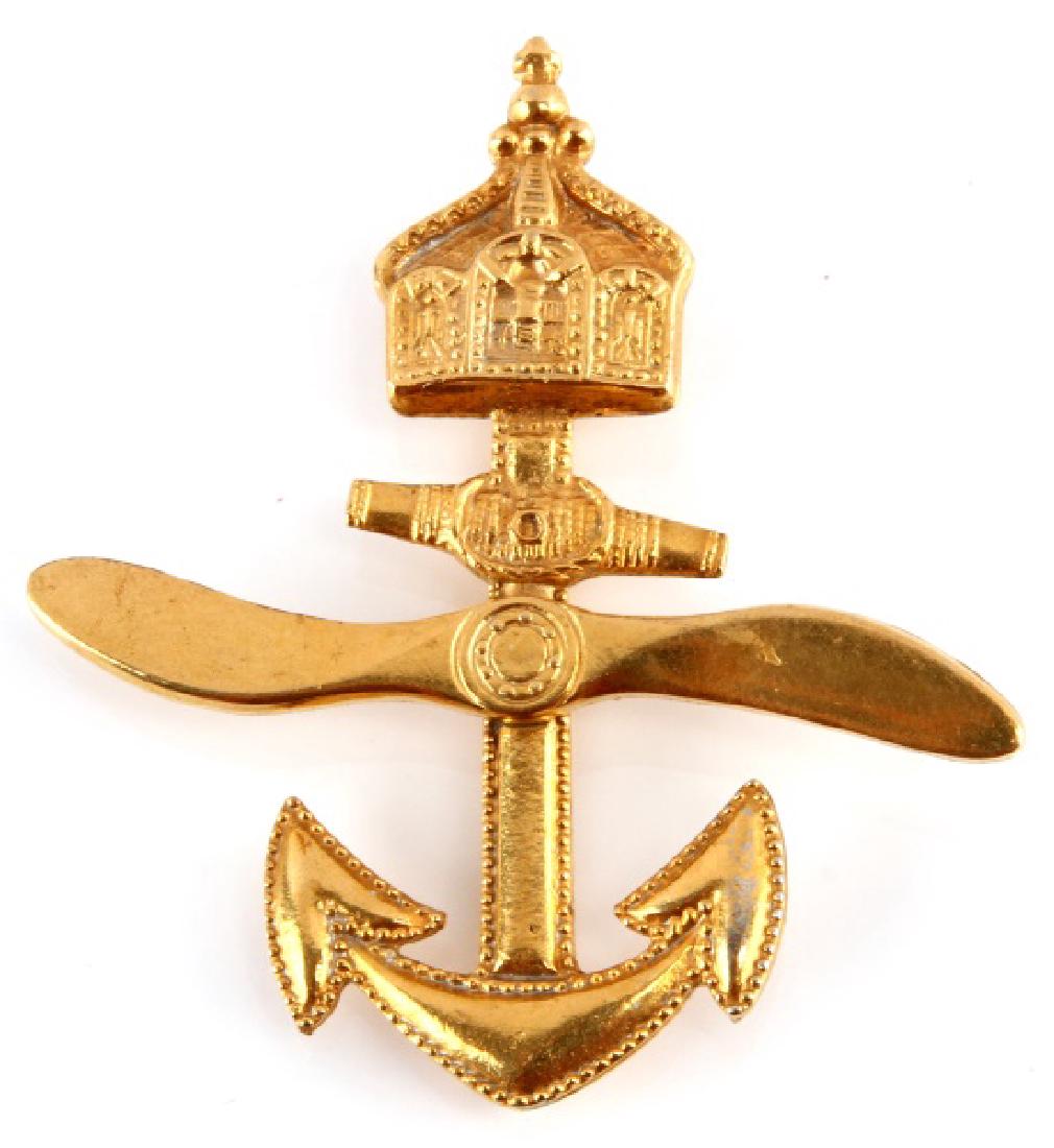 WWI IMPERIAL GERMAN NAVAL AVIATOR PILOT BADGE: Imperial German World War I Naval Aviator Pilot Badge. Measures 2" wide by 2 3/16" tall. Has a wide vertical pin back. Two piece brass construction. Unauthenticated, sold as is.