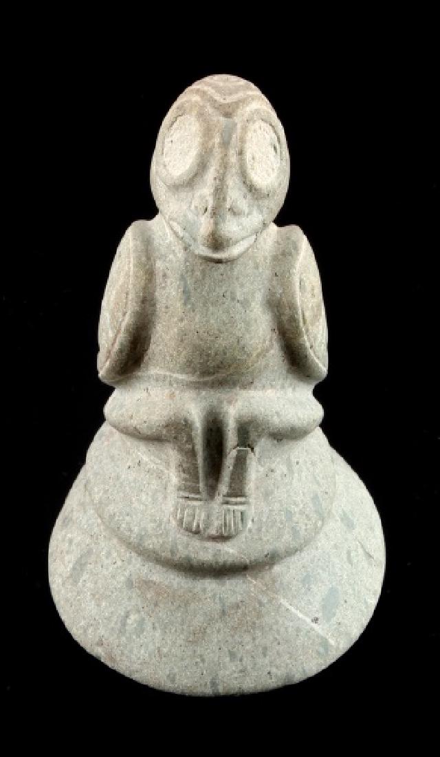 PRE COLUMBIAN TAINO CEREMONIAL BIRD COHOBA PESTLE: A Taino Classic Period (1000-1500 AD) figural ceremonial pestle measuring 3-1/2 inches long by 2-3/4 inches wide at the base and standing 4-3/4 inches tall. The pestle is hand-carved and ground from a