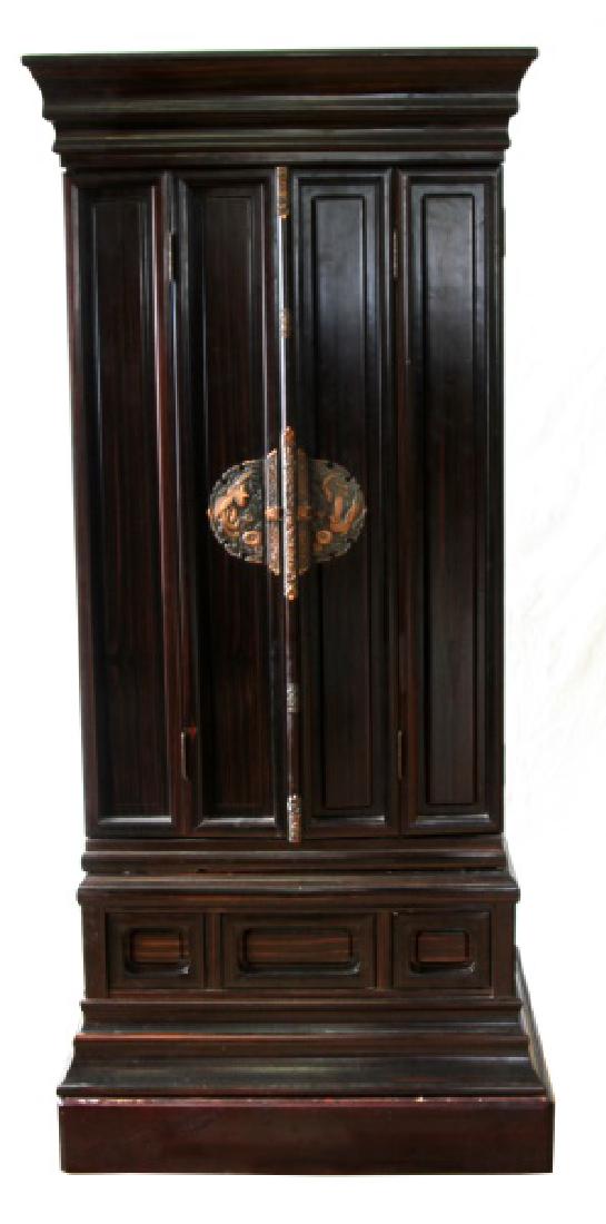 CRANE THEMED WOODEN BUDDHIST ALTER: A dark wood Buddhist altar with a distinctive crane decorative theme. The altar is in the form a a standing 3 drawer, two door cabinet on two stacked wood platform plinths. Altar and plinths together 