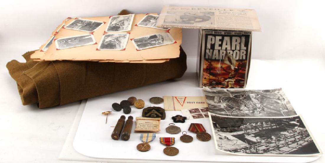 WWII US ARMY MEDALS PHOTOS BUTTONS POST CARDS: A collection of items relating to the US Army during WWII. The collection includes the January 28, 1942 issue of "The Reveille" from Camp Shelby Mississippi; 17 black and white photos of soldiers in c