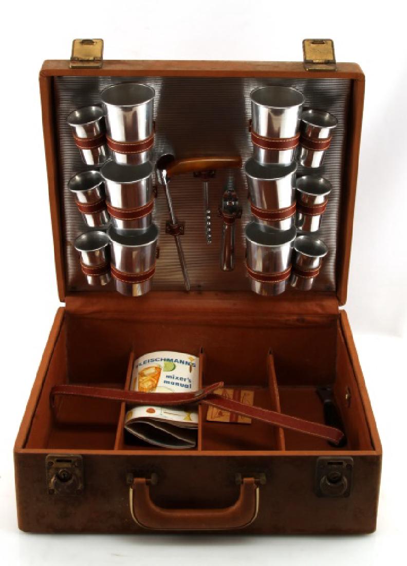 TRAVEL BAR SET AND CASE LYNDHURST PLANTATION: Vintage mid 20th century (50s 60s) traveling bar set in a locking leather bound case, from the Lyndhurst Plantation, Greenville, Florida. The case measures 15 inches by 13 inches by 5-3/4 inches. The
