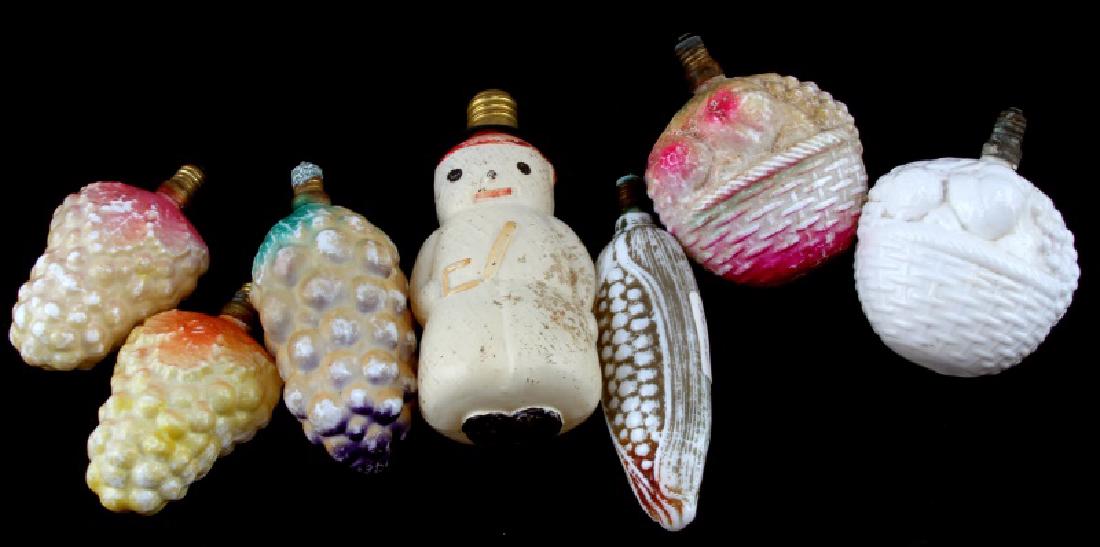 LARGE PRE WWII PAINTED MILK GLASS CHRISTMAS LIGHTS: A collection of 7 larger format, hand-painted, milk glass Christmas lights. All were made in Japan, six pre-1946 and one possibly after 1952. The six early lights include 3 grape bunches, 2 fruit bask