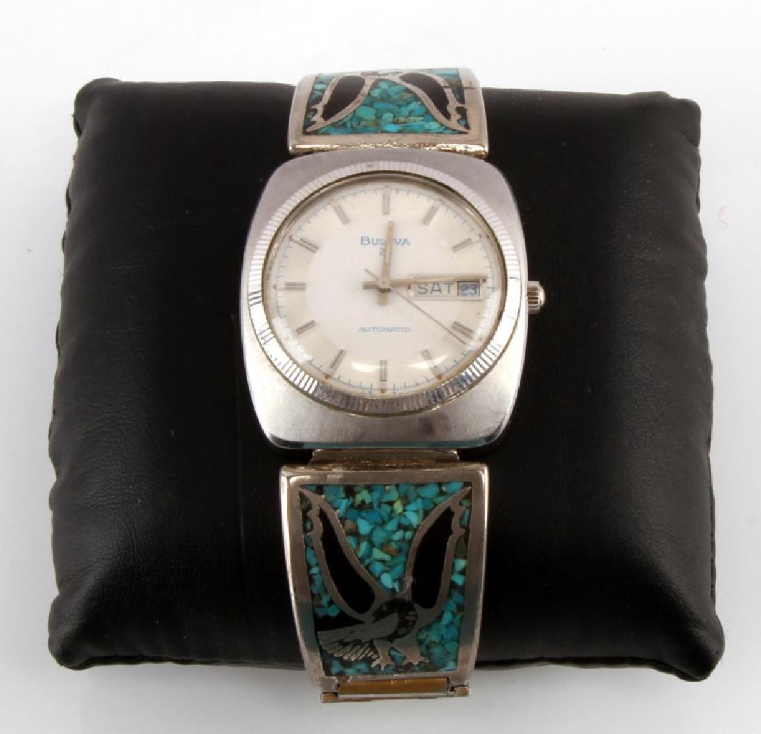 MEN'S BULOVA WRISTWARCH WITH TURQUOISE EAGLE BAND: Automatic 23 Bulova wristwatch with turquoise bands with black enamel eagles. Working. Very ogod condition.