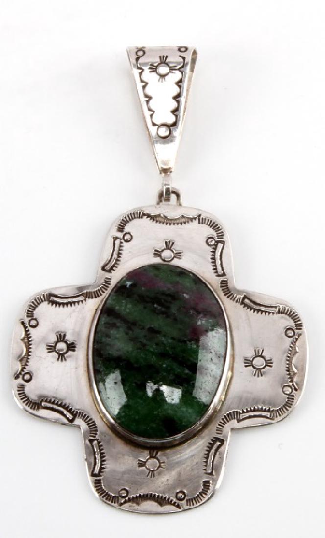 NAVAJO JESSE CLAW STERLING PENDANT WITH GREENSTONE: 5 x 5 cm. Reverse marked JC sterling. Very good condition.