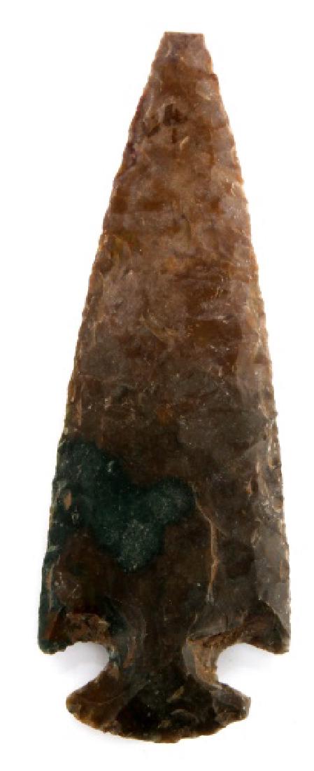 ST CHARLES DOVETAIL EARLY ARCHAIC PROJECTILE POINT: A large, slightly excurvate, corner-notched, convex base projectile point. The large Pennsylvania dart point is made from a mottled brow, green, red, and yellow chert; and measures 11.2 cm long (4-3/4