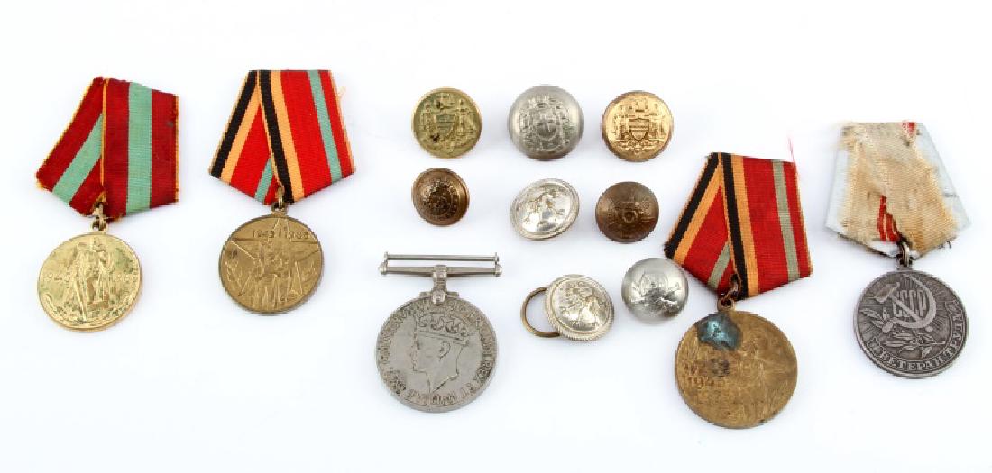 ASSORTED US MILITARY GULF WAR WWI MEMORABILIA: Includes a 1990 desert shield hat pin, an operation desert storm cloth badge, a metal service whistle on a red cord, a sergeant rank insignia with Velcro applicators, and a British sergeant rank insig