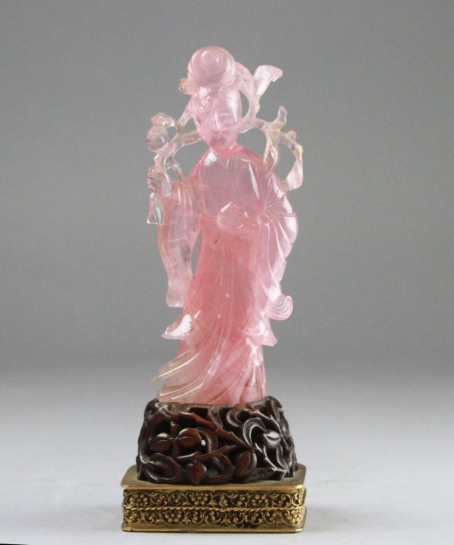 Quartz Figure: Height: 9.375 inches, Width: 3.375 inches, Depth: 3 inches.