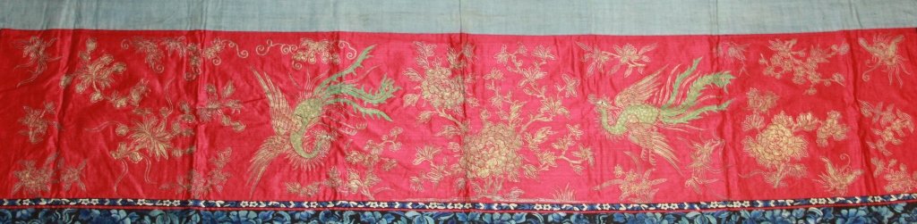 A Chinese Embroidery Of Pheonixes: Height: 21 inches, Width: 75.5 inches.