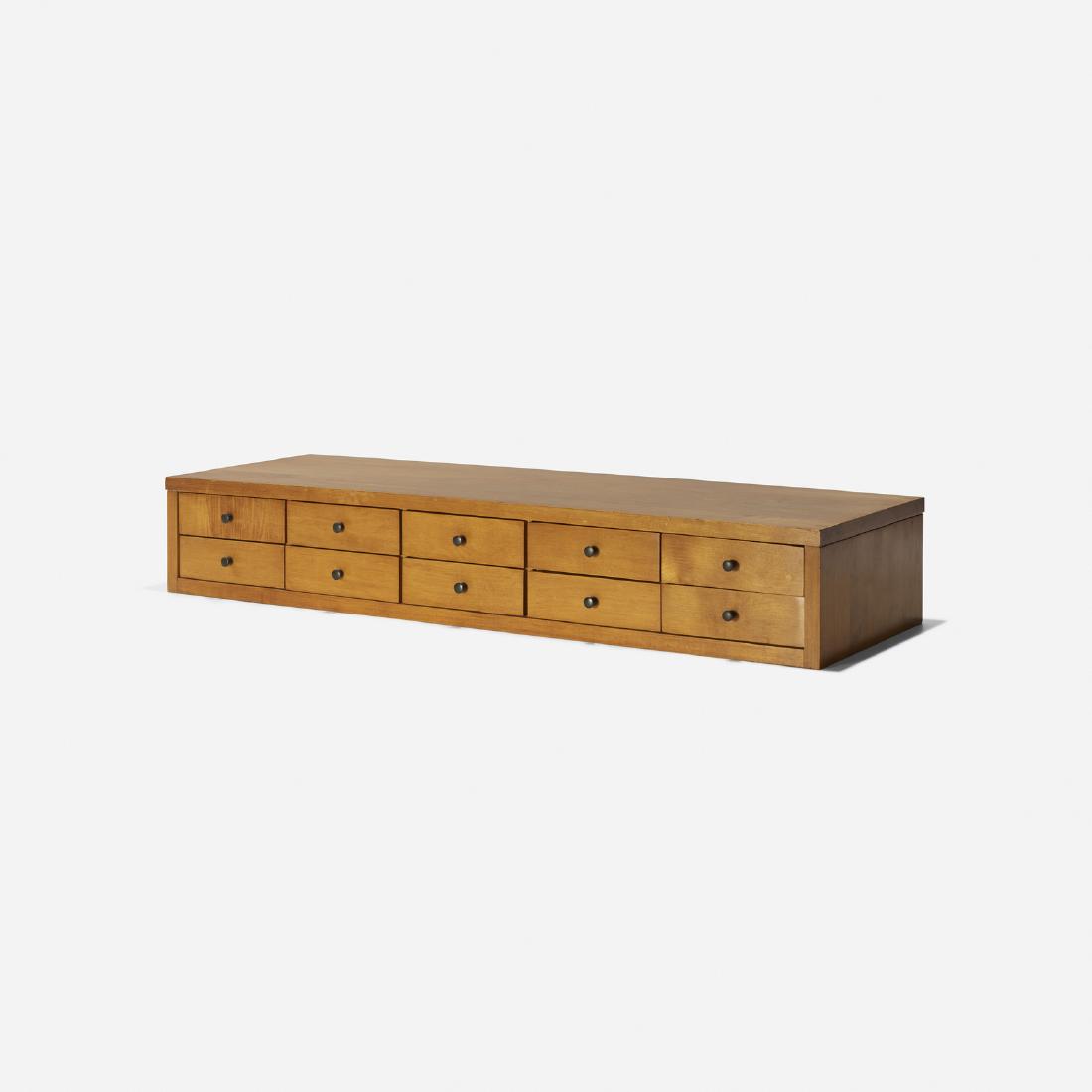 Paul McCobb, Planner Group cabinet, model 1502: Paul McCobb Planner Group cabinet, model 1502 WinchendonUSA, 1952maple, enameled steel36 w x 12.5 d x 6 h in (91 x 32 x 15 cm) Cabinet features ten drawers. Literature: