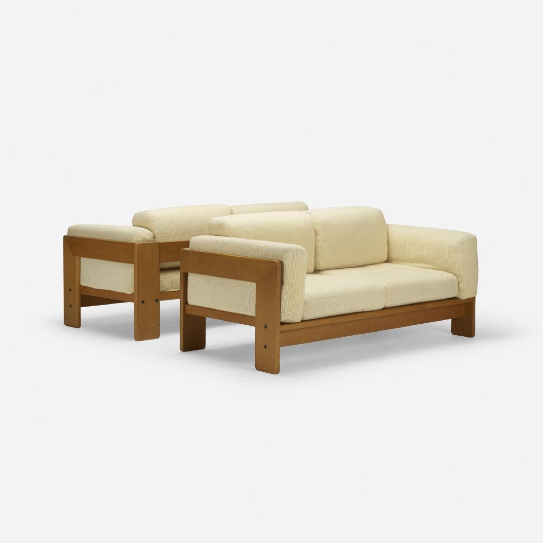 Afra and Tobia Scarpa, Bastiano settees, pair: Afra and Tobia Scarpa Bastiano settees, pair Knoll InternationalItaly / USA, c. 1970stained oak, upholstery59.5 w x 32 d x 29 h in (151 x 81 x 74 cm) Signed with decal manufacturer's label