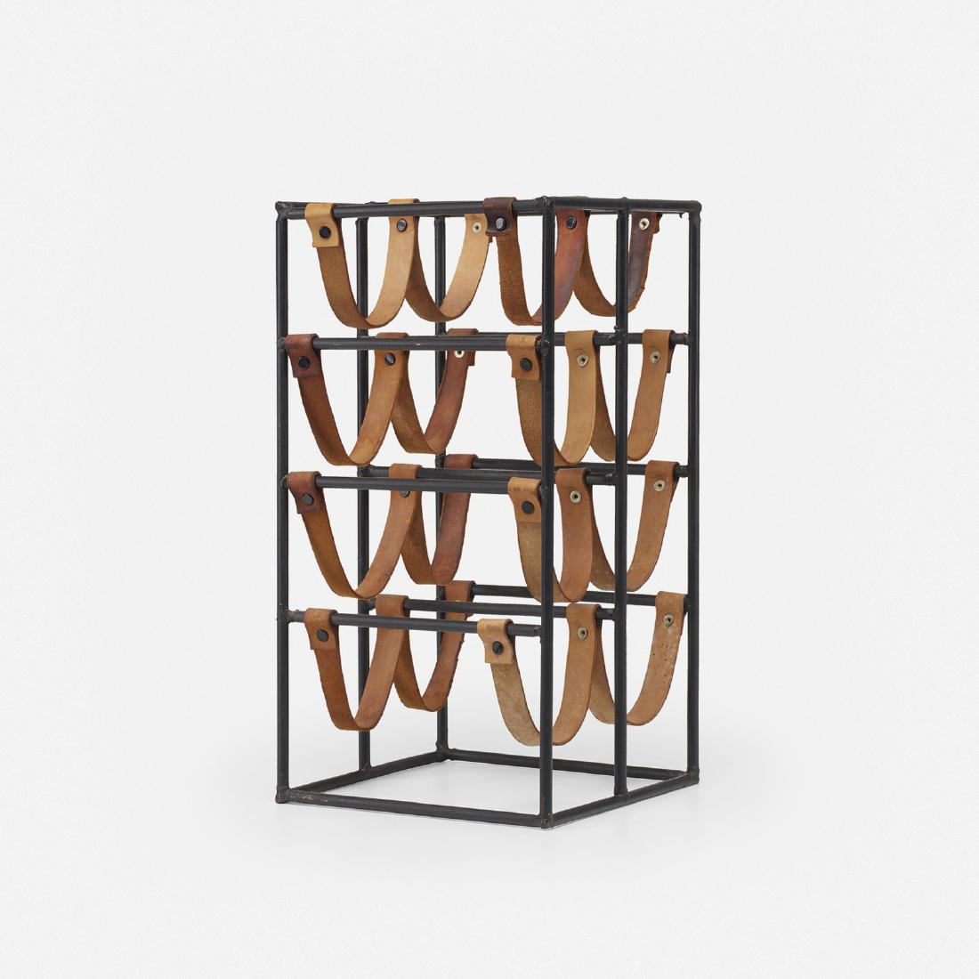 Arthur Umanoff, wine rack: Arthur Umanoff wine rack RaymorUSA, c. 1950enameled steel, leather9.5 w x 10 d x 18.5 h in (24 x 25 x 47 cm) Rack holds up to eight bottles.