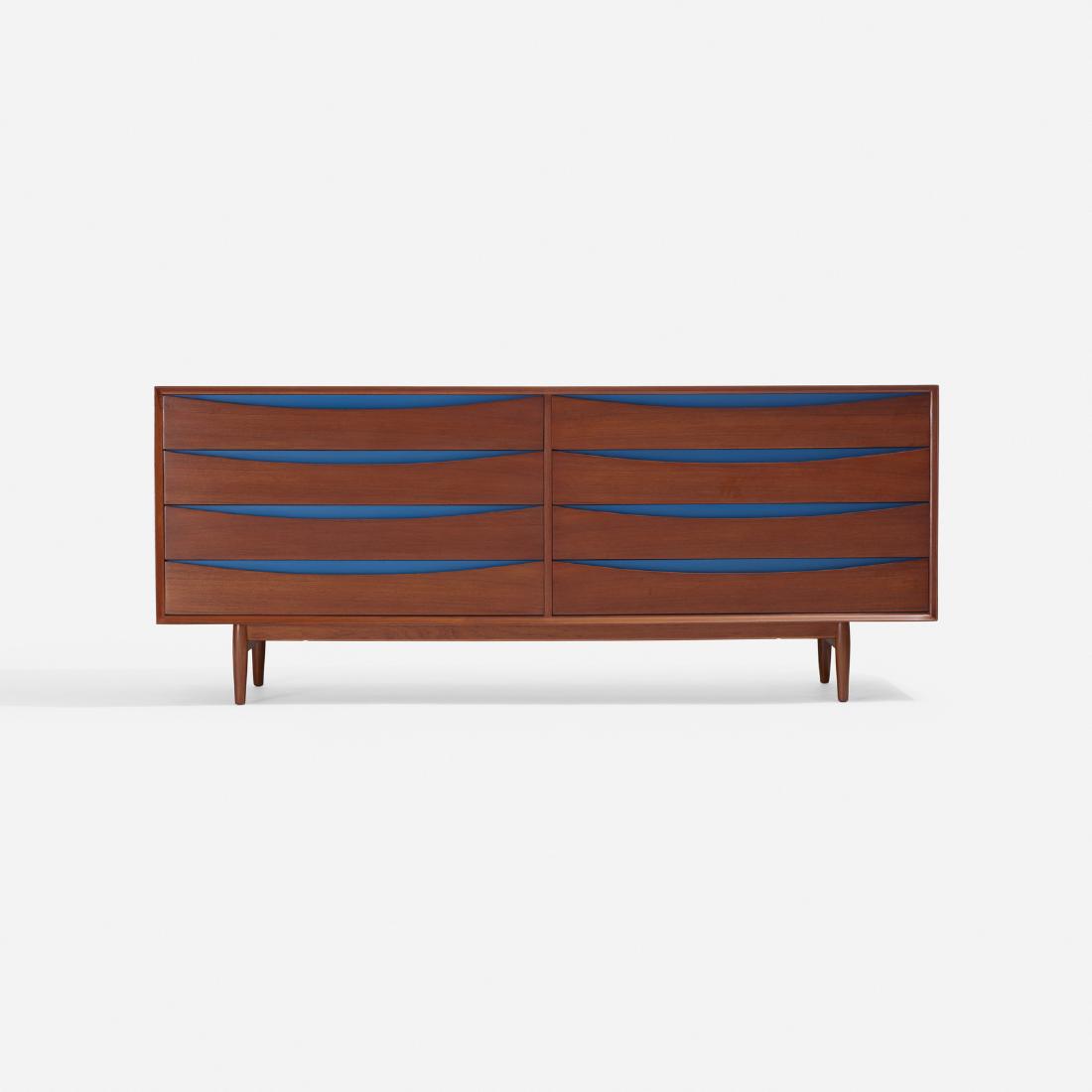Arne Vodder, cabinet: Arne Vodder cabinet Sibast FurnitureDenmark, 1960teak, lacquered wood77.5 w x 19.5 d x 32 h in (197 x 50 x 81 cm) Signed with decal manufacturer's label to drawer: [Sibast Furniture Made in