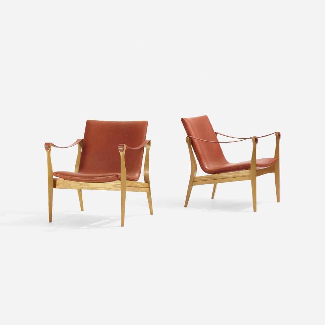 Karen & Ebbe Clemmensen, lounge chairs: Karen and Ebbe Clemmensen lounge chairs model 4305, pair Fritz HansenDenmark, 1963 / c. 1980ash, leather, blackened brass24.5 w x 26 d x 28.5 h in (62 x 66 x 72 cm) Signed with decal manufa