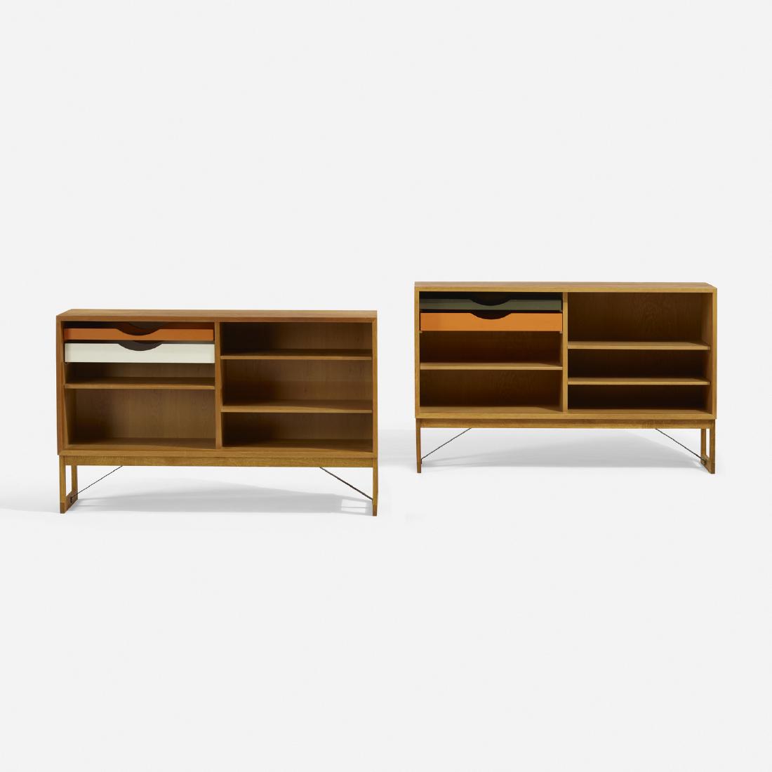 Borge Mogensen, cabinets, pair: Borge Mogensen cabinets, pair Karl Andersson & SonerDenmark / Sweden, c. 1955oak, lacquered wood, patinated steel53 w × 14 d × 33 h in (135 × 36 × 84 cm) Each cabine
