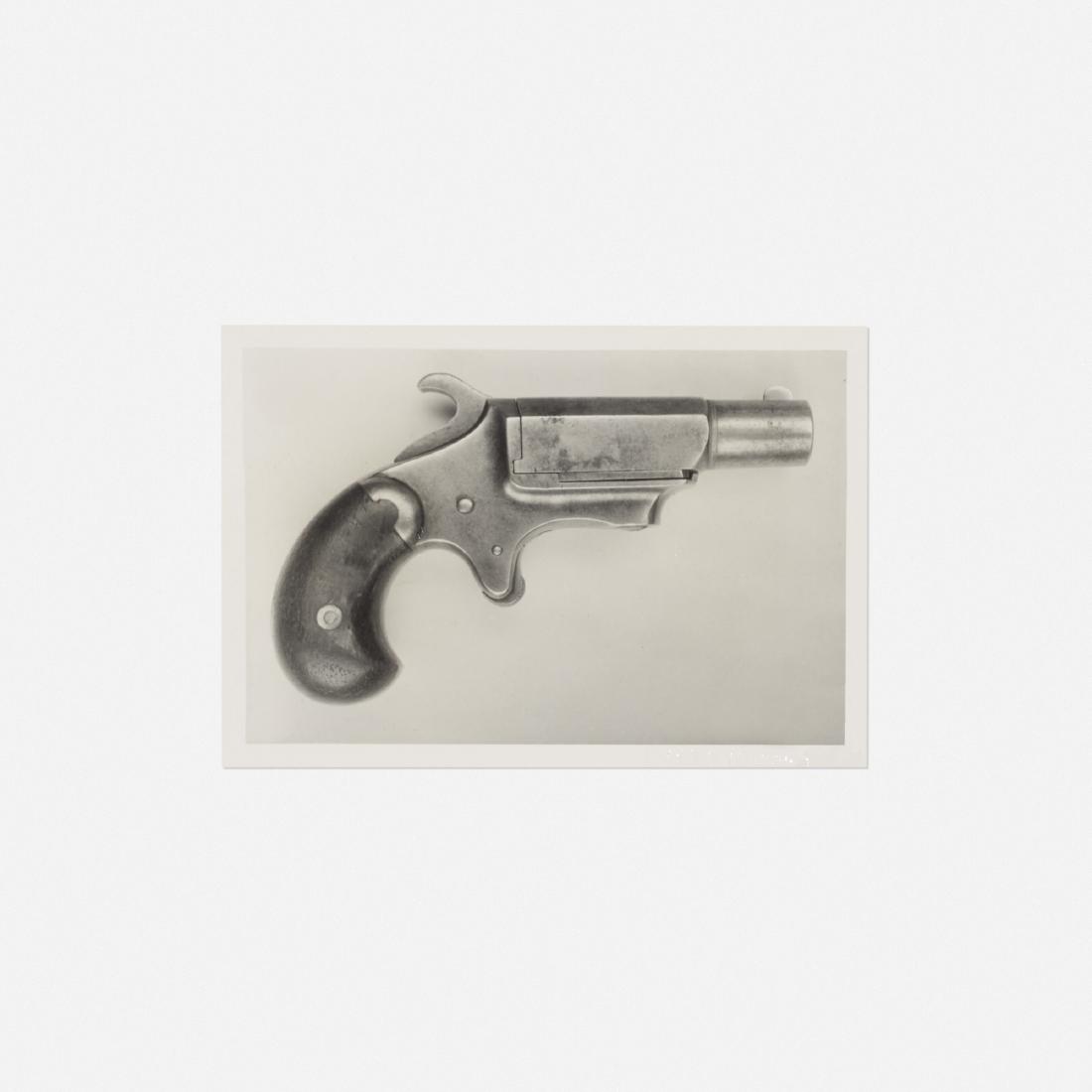Andy Warhol, Untitled (Gun): Andy Warhol Untitled (Gun) Polaroid3.5 h × 5 w in (9 × 13 cm) Impressed to lower edge 'Andy Warhol'. Estate stamp to verso 'Estate of Andy Warhol Stamp of Authenticity'.