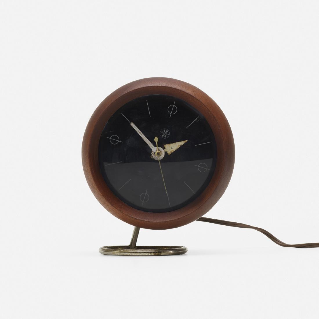 George Nelson & Associates, table clock, model 4765A: George Nelson & Associates table clock, model 4765A Howard Miller Clock CompanyUSA, 1949walnut, glass, chrome-plated steel, enameled aluminum5.75 w × 5 d × 7 h in (15 × 13 ×