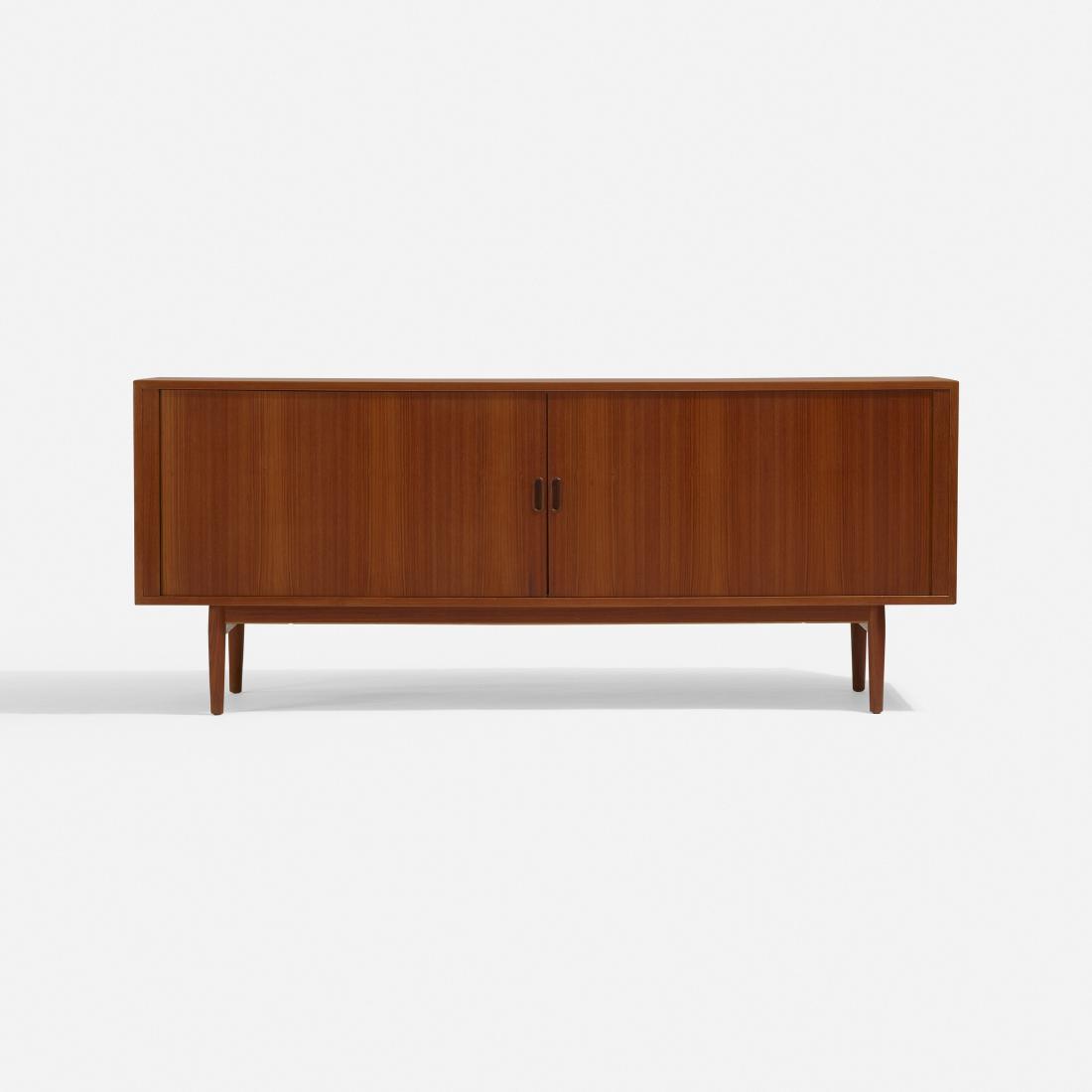 Arne Vodder, cabinet: Arne Vodder cabinet Sibast FurnitureDenmark, c. 1960teak74.5 w × 18.5 d × 30.5 h in (189 × 47 × 77 cm) Cabinet features two tambour doors concealing four adjustable