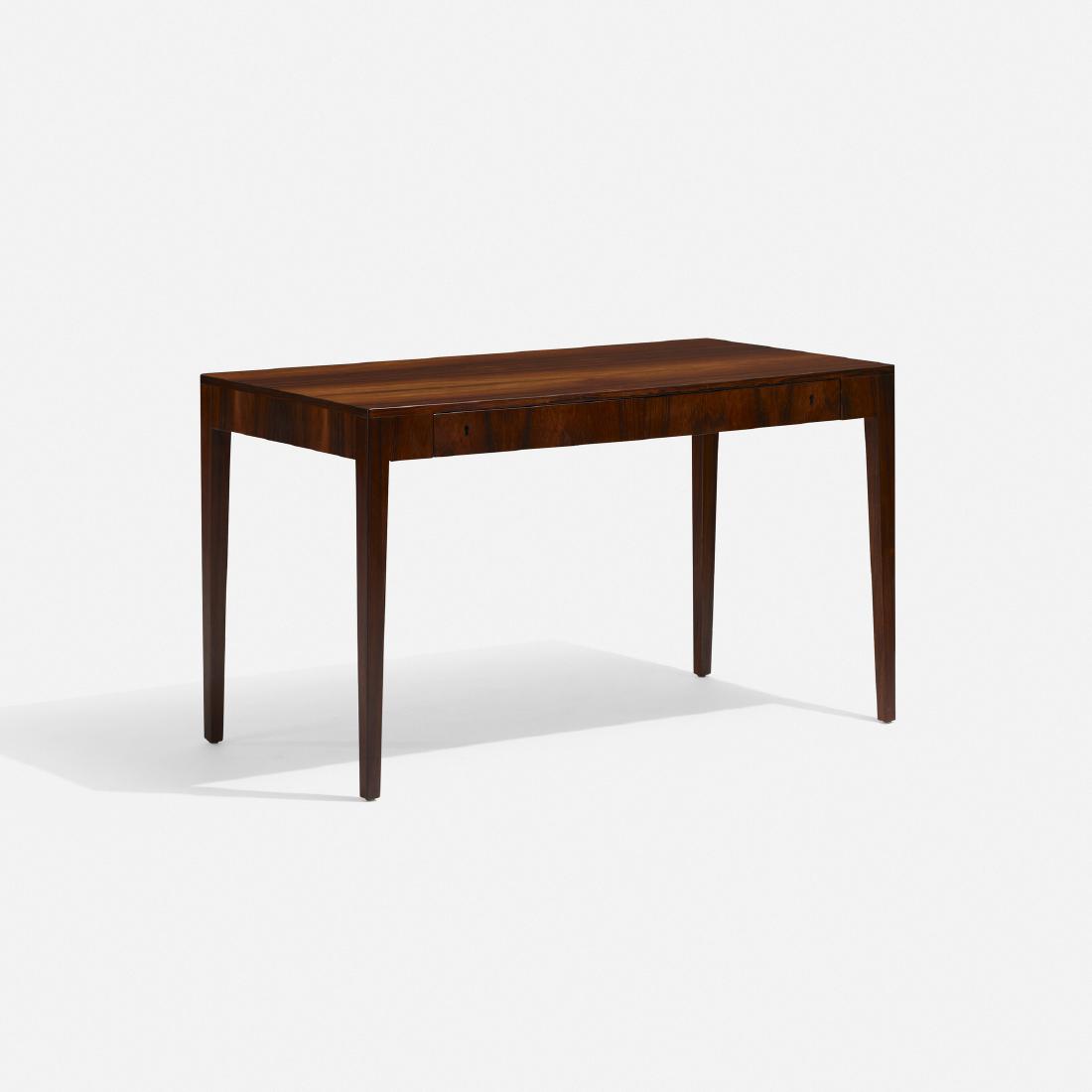 Severin Hansen Jr., desk: Severin Hansen Jr. desk Haslev Mobelsnedkeri A/SDenmark, c. 1965rosewood, brass47 w × 23.5 d × 27.75 h in (119 × 60 × 70 cm) Desk features two drawers.