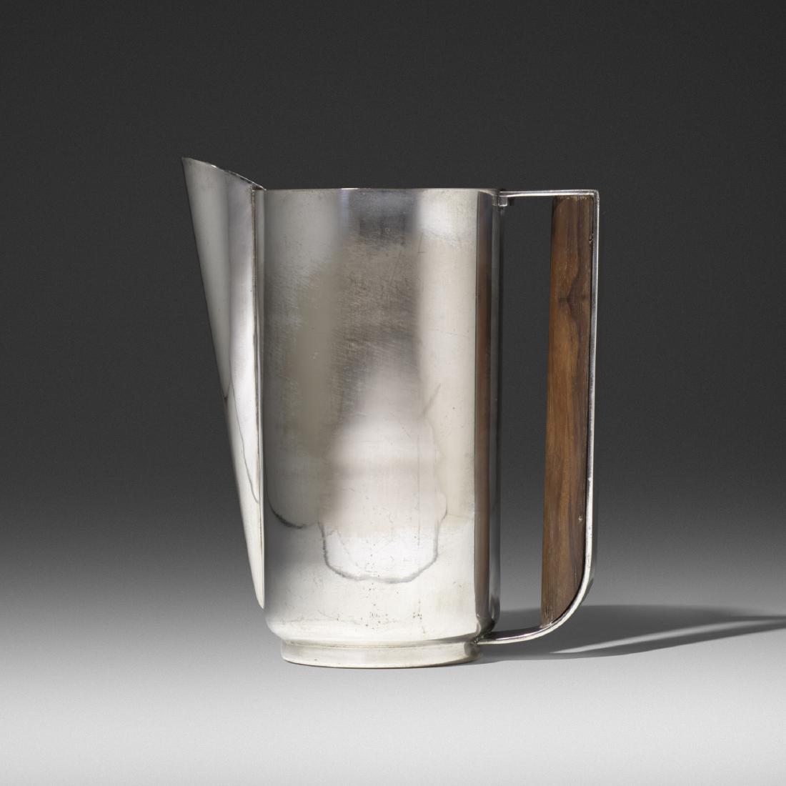 Kem Weber, Silver Style pitcher: Kem Weber Silver Style pitcher Friedman Silver CompanyUSA, 1928electro-plated nickel silver, rosewood7 w × 4 d × 8.25 h in (18 × 10 × 21 cm) Signed with impressed ma
