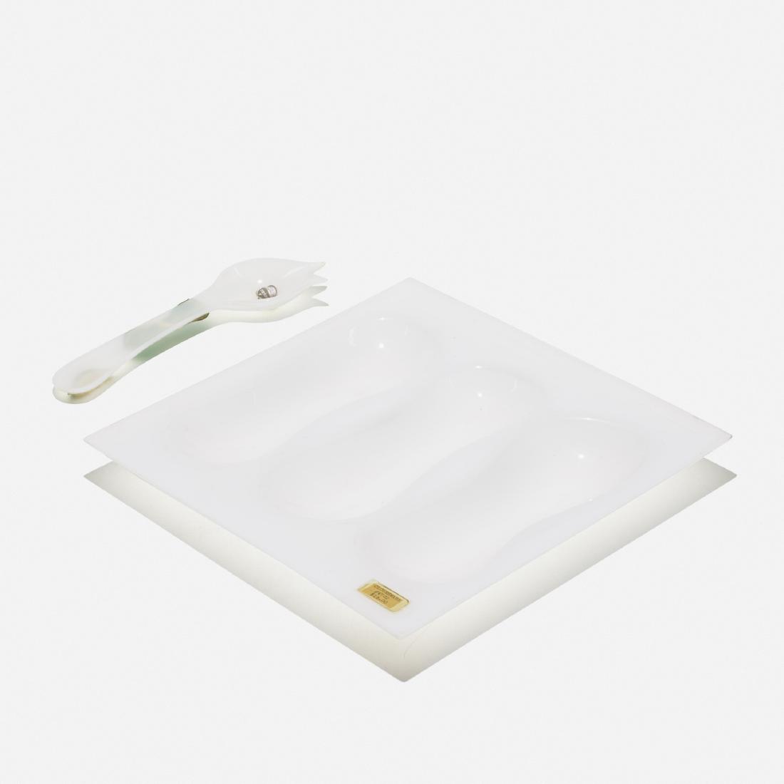 Eva Zeisel, Prototype Cloverware serving dish and spoon: Eva Zeisel Prototype Cloverware serving dish and spoon Clover PlasticsHungary / USA, 1947acrylic plastic14 w × 14 d × 1.5 h in (36 × 36 × 4 cm) Signed with decal man
