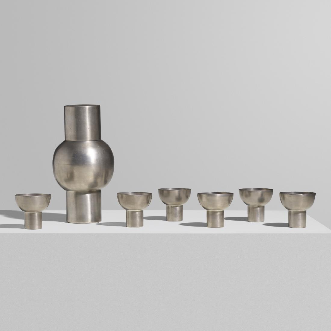 Russel Wright, Early and Rare cocktail set: Russel Wright Early and Rare cocktail set Wright Accessories CompanyUSA, c. 1930pewter5.5 dia × 9 h in (14 × 23 cm) Set includes six cups and one shaker comprised of a base, str