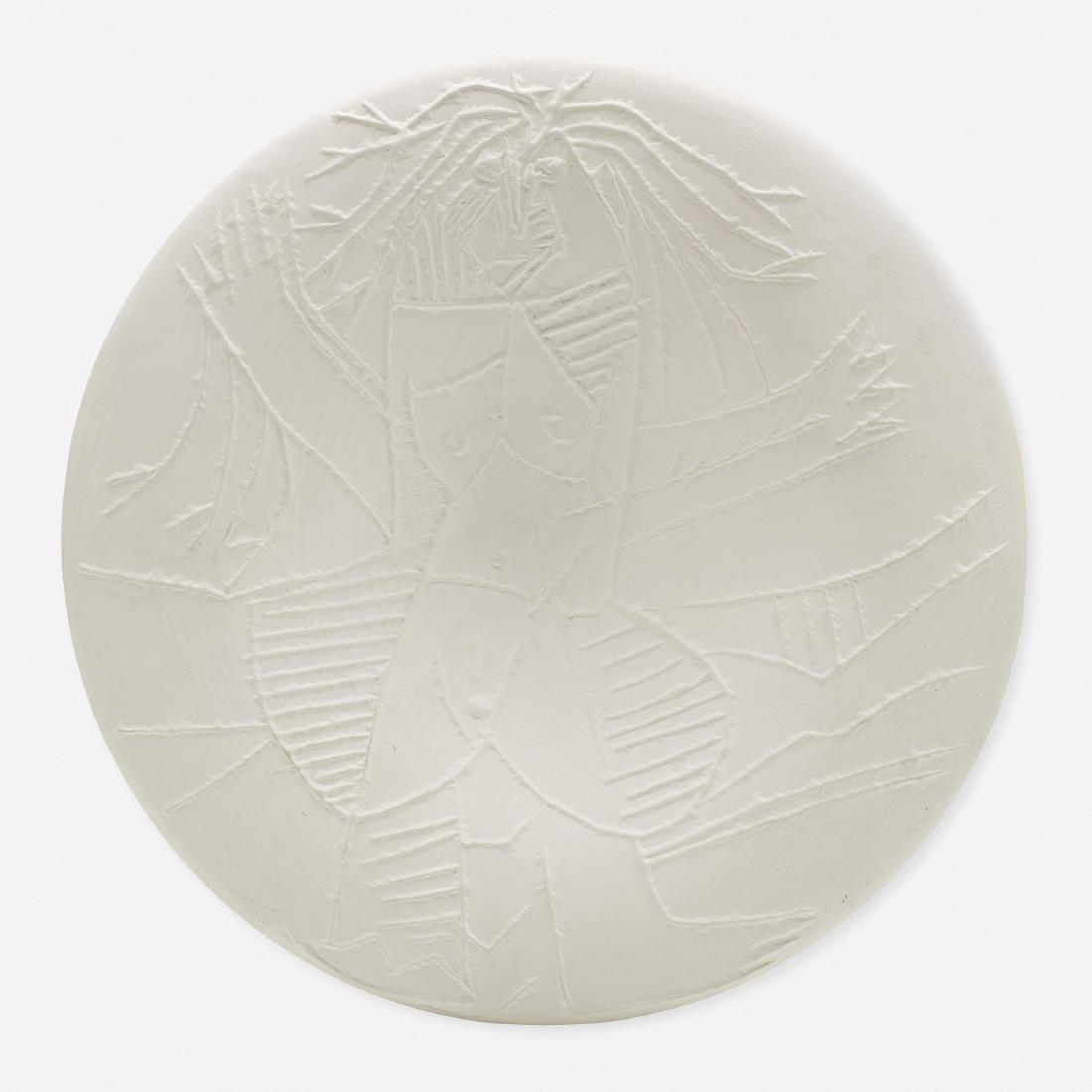 Pablo Picasso, Dishevelled Woman: Pablo Picasso Dishevelled Woman 1963 white earthenware clay 10.5 dia in (27 cm) Incised studio mark and glazed number to verso 'Madoura Plein Feu Empreinte Originale de Picasso Edition Picasso 27/1