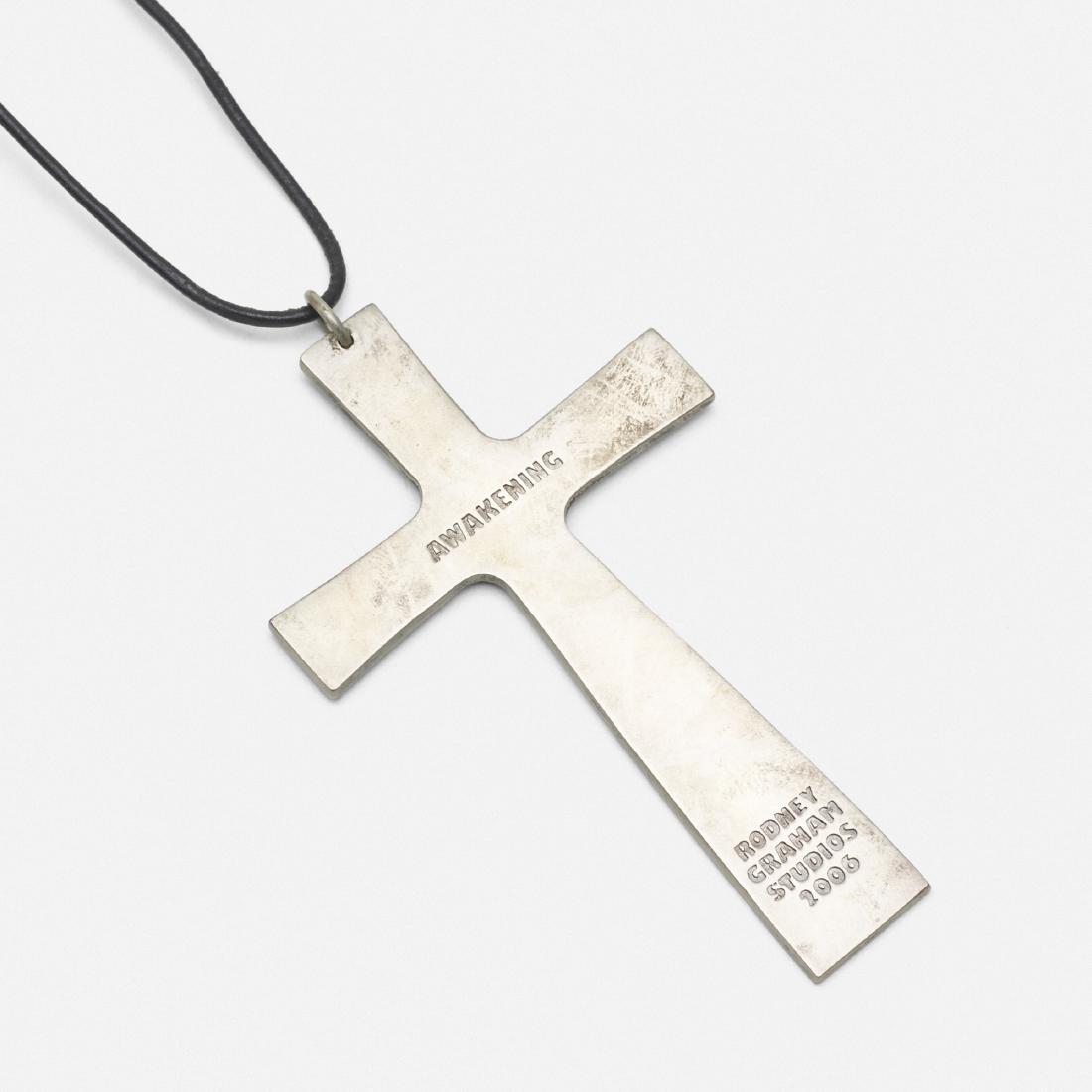 Rodney Graham, Awakening Cross: Rodney Graham Awakening Cross 2006silver, cord4.25 h × 2.5 w × 0.25 d in (11 × 6 × 1 cm) Engraved signature, title and date to verso 'Awakening, Rodney Graham Studios 2006