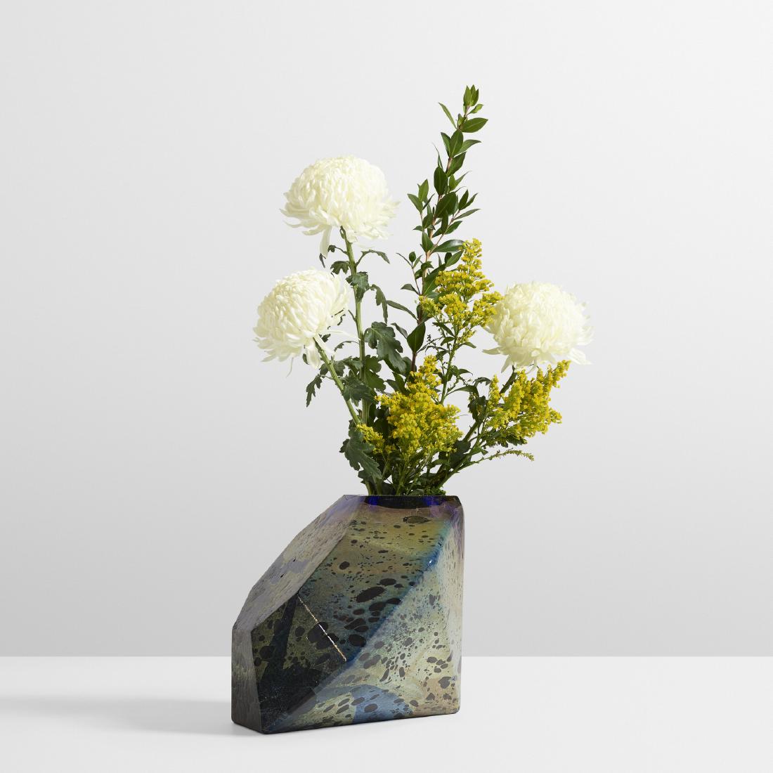 John Torreano, Polyhedral vase: John Torreano Polyhedral vase c. 1980 iridized blue glass 8 h × 8 w × 11 d in (20 × 20 × 28 cm)