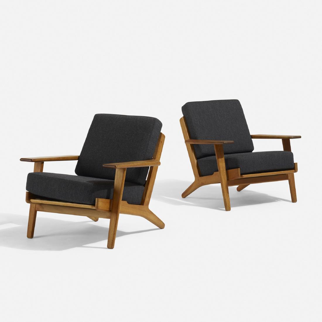 Hans J. Wegner, lounge chairs model GE240, pair: Hans J. Wegner lounge chairs model GE240, pair GetamaDenmark, 1955oak, upholstery29.5 w × 32 d × 29.5 h in (75 × 81 × 75 cm) Branded manufacturer's mark to underside