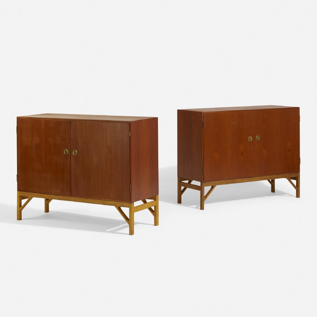 Borge Mogensen, cabinets, pair: Borge Mogensen cabinets, pair Fredericia Denmark, c. 1940 teak, oak, brass 48 w × 18 d × 36.5 h in (122 × 46 × 93 cm) Each cabinet features two locking doors concealing