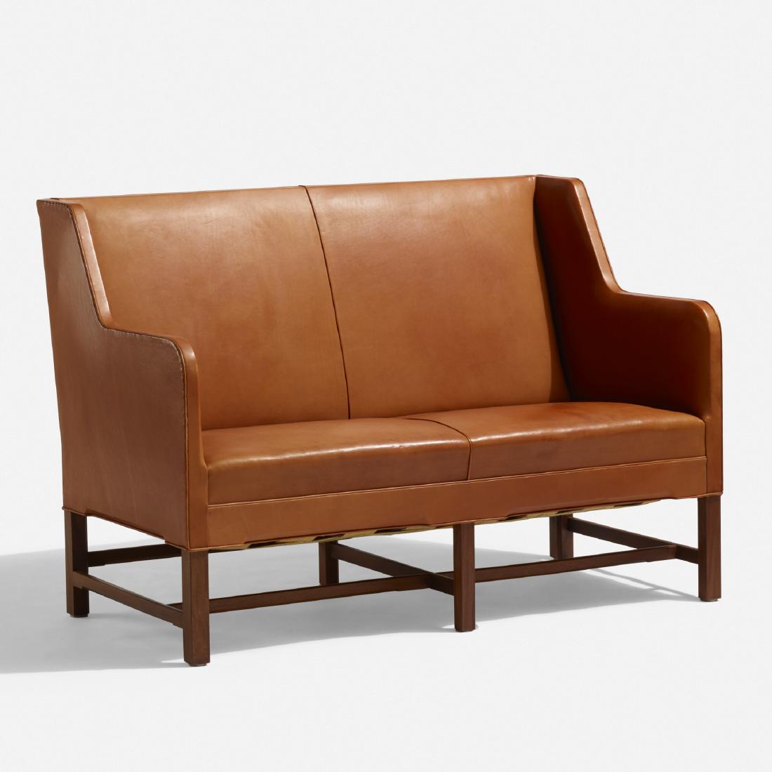 Kaare Klint, settee, model 5011: Kaare Klint settee, model 5011 Rud. Rasmussens SnedkerierDenmark, 1935leather, mahogany51.75 w × 29.5 d × 36 h in (131 × 75 × 91 cm) Manufacturer's label to undersid