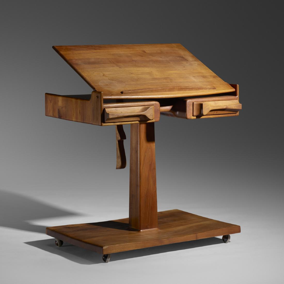Federico Armijo, bookstand: Federico Armijo bookstand USA, 1975carved and laminated walnut35.5 w × 25.5 d × 44 h in (90 × 65 × 112 cm) Bookstand features an adjustable tabletop and two drawers. Signe