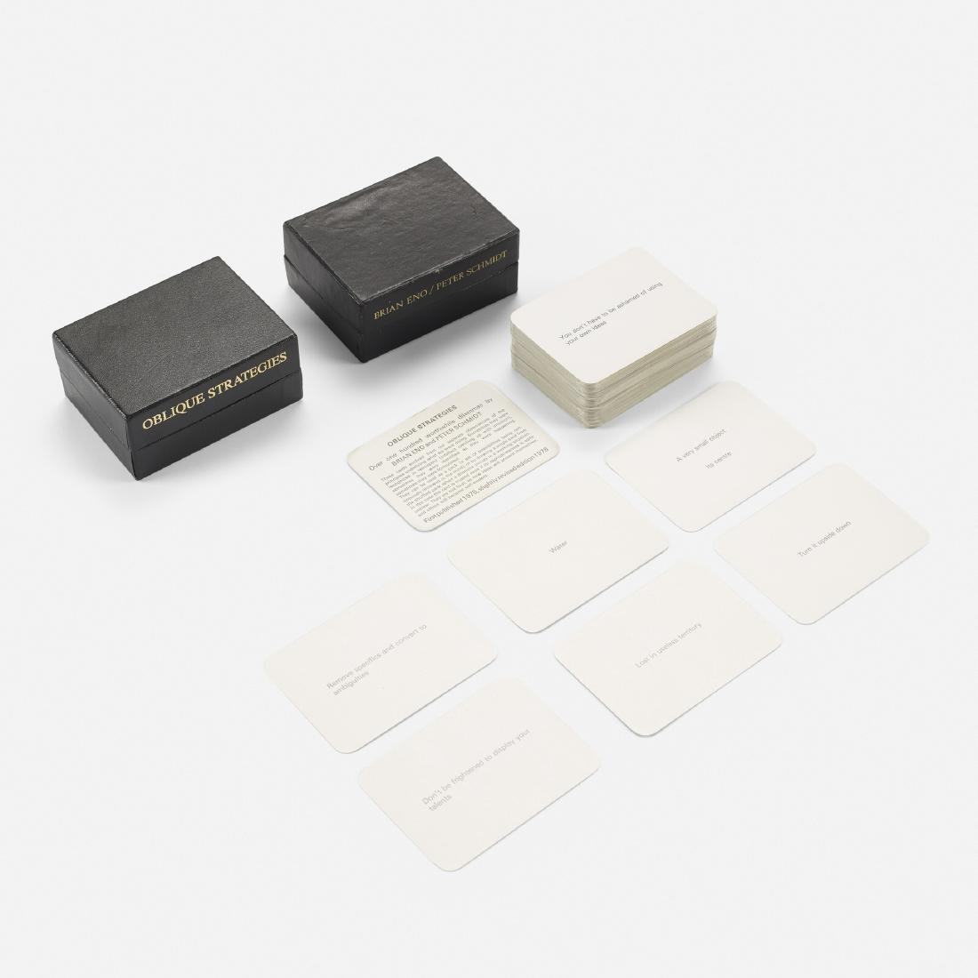 Brian Eno and Schmidt, Oblique Strategies, set of two: Brian Eno and Peter Schmidt Oblique Strategies, set of two United Kingdom, 1978/2001 printed paper 4.25 w × 3.25 d × 1.75 h in (11 × 8 × 4 cm) Lot includes two sets of Ob