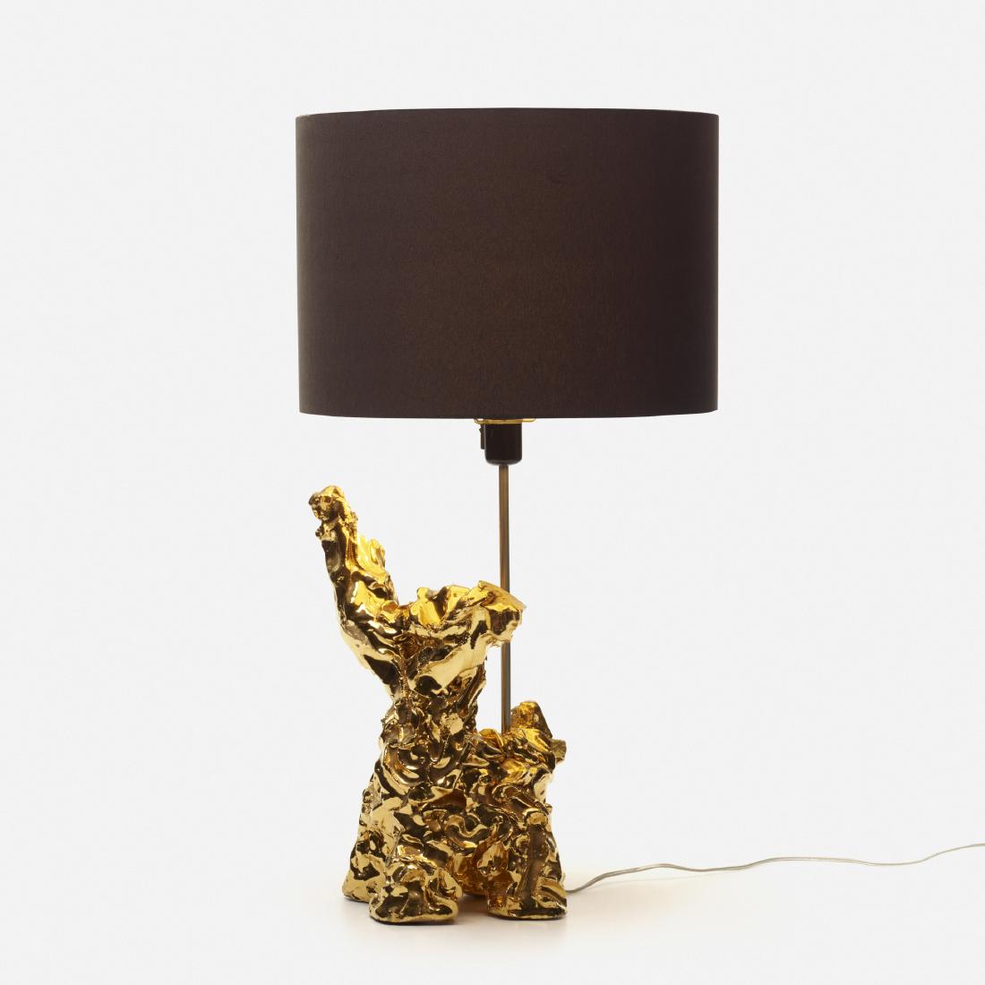 Marcel Wanders, One Minute Sculpture: Marcel Wanders One Minute Sculpture The Netherlands, 2016gilt-glazed ceramic, stainless steel, linen16 dia × 29 h in (41 × 74 cm) Signed to body ‘Wanders'.