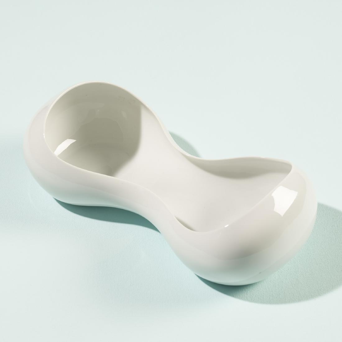 Eva Zeisel, prototype bowl: Eva Zeisel prototype bowl United China and Glass CompanyHungary / USA, c. 1960porcelain16 w × 7.75 d × 4.75 h in (41 × 20 × 12 cm) Paper studio label to underside 'N