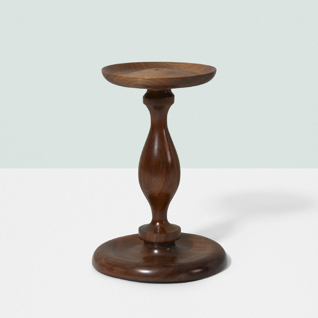 Eva Zeisel, prototype table: Eva Zeisel prototype table Hungary, c. 1990carved walnut13.5 dia × 19.5 h in (34 × 50 cm) Signed to underside ‘Eva Zeisel'. Provenance: Collection of the artis