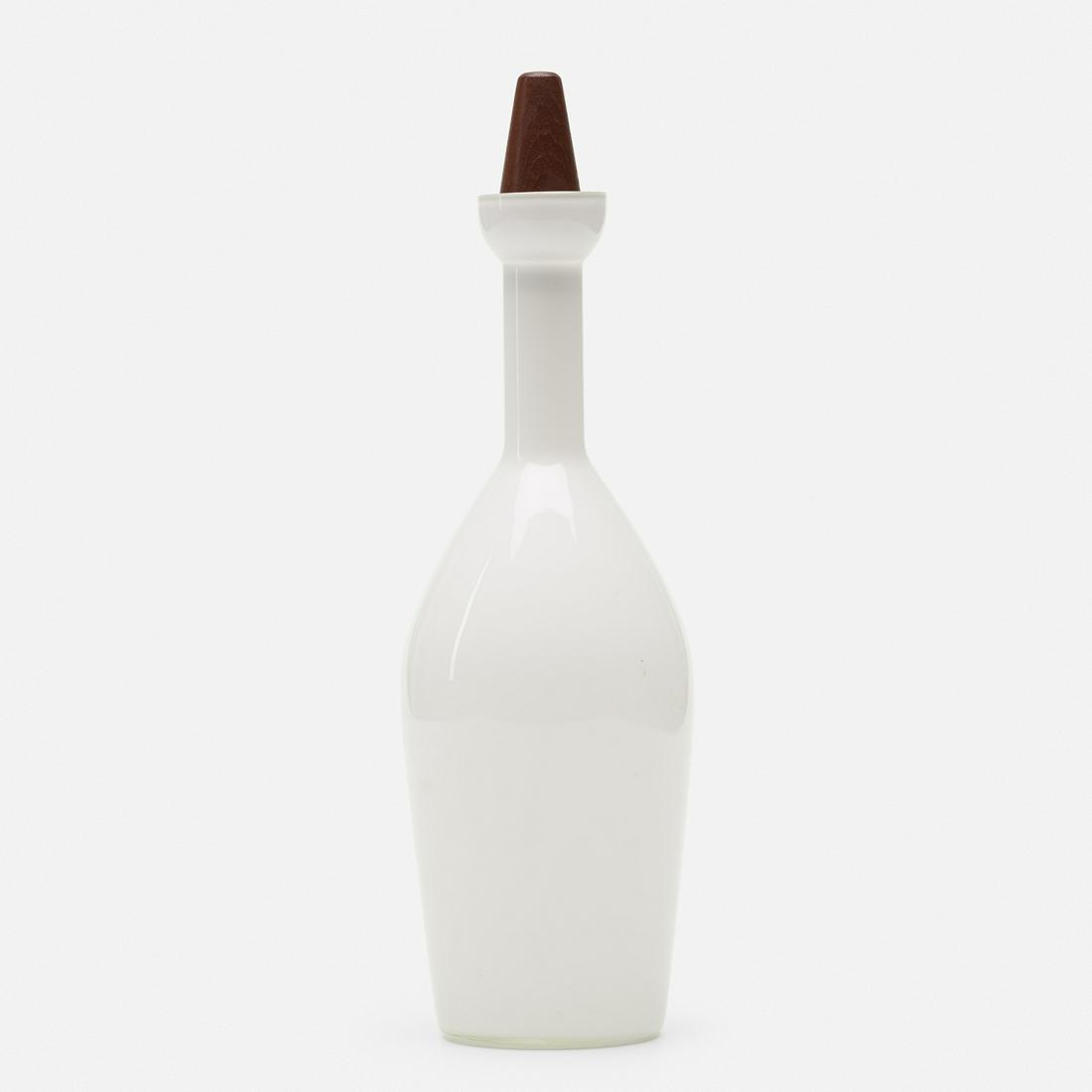 Otto Brauer, bottle with stopper: Otto Brauer bottle with stopper Kastrup-HolmegaardDenmark, c. 1960glass, teak, cork4 dia × 13 h in (10 × 33 cm) Decal manufacturer's label to bottle ‘Kastrup Glas Made in Denmar