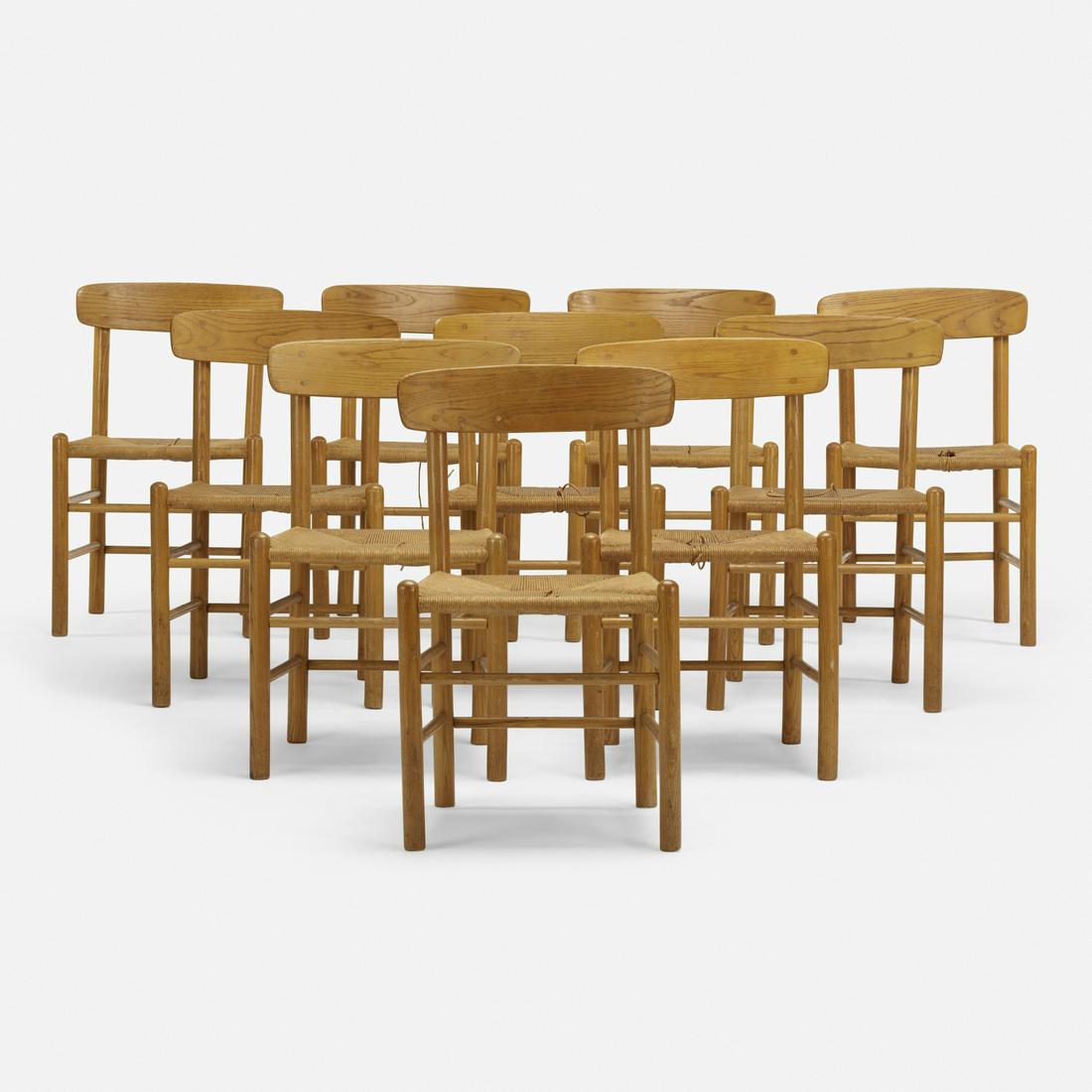 In the manner of Borge Mogensen, ten dining chairs: In the manner of Borge Mogensen dining chairs, set of ten Denmark, c. 1965 oak, rush 19 w × 17 d × 31.5 h in (48 × 43 × 80 cm)