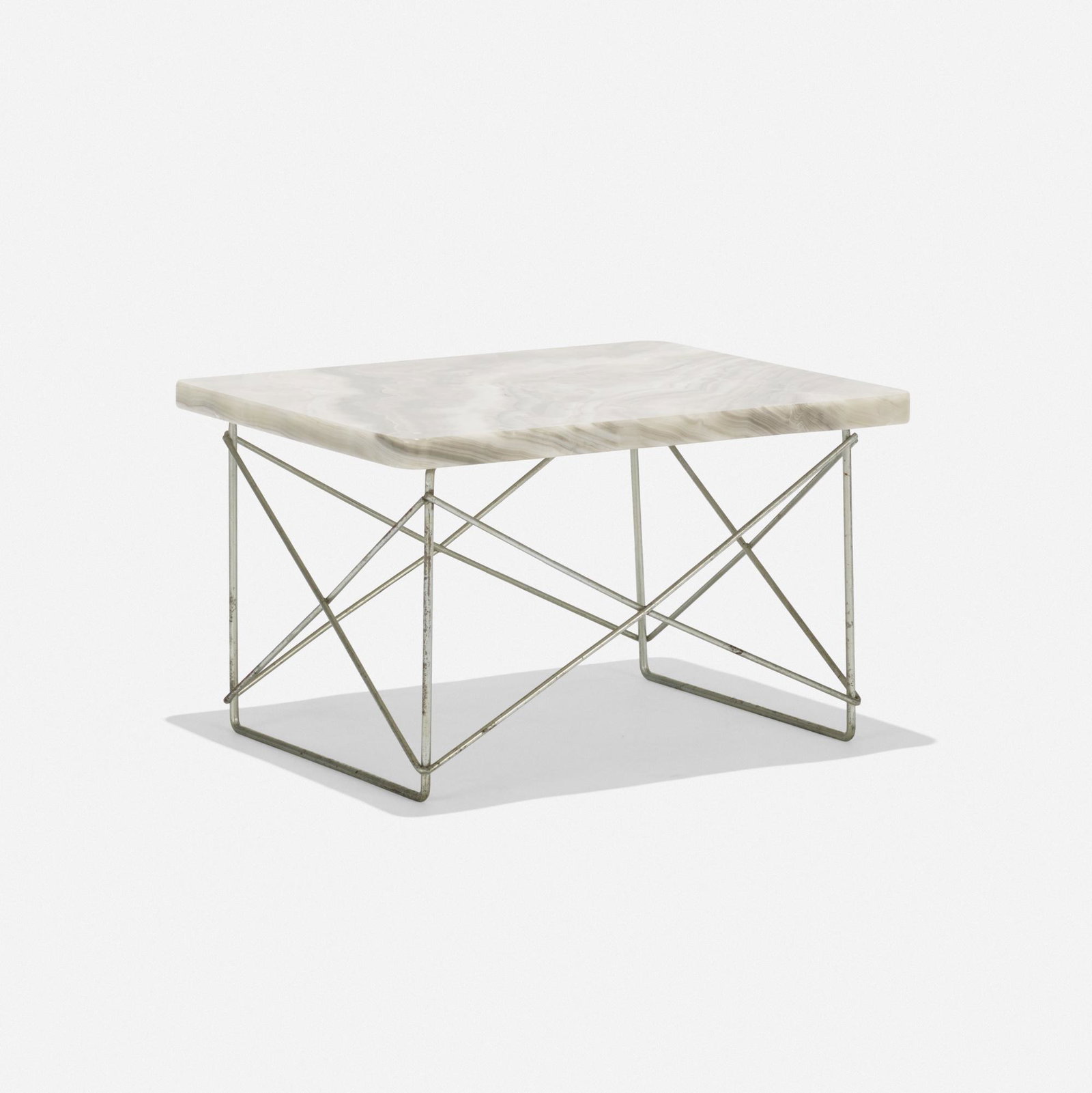 Charles and Ray Eames, special-order LTR: Charles and Ray Eames special-order LTR Herman Miller USA, 1950 onyx, chrome-plated steel 16 w × 14 d × 9.75 h in (41 × 36 × 25 cm) This special-order LTR features a cu