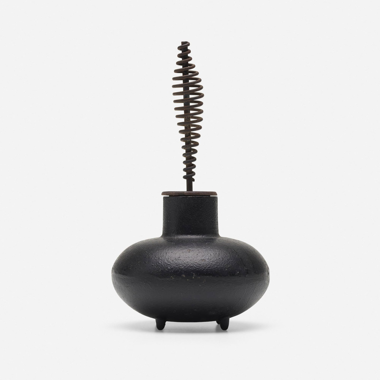 George Nelson & Associates, firestarter: George Nelson & Associates firestarter Howard Miller Clock Company USA, c. 1950 cast iron 6.25 dia × 11.5 h in (16 × 29 cm)