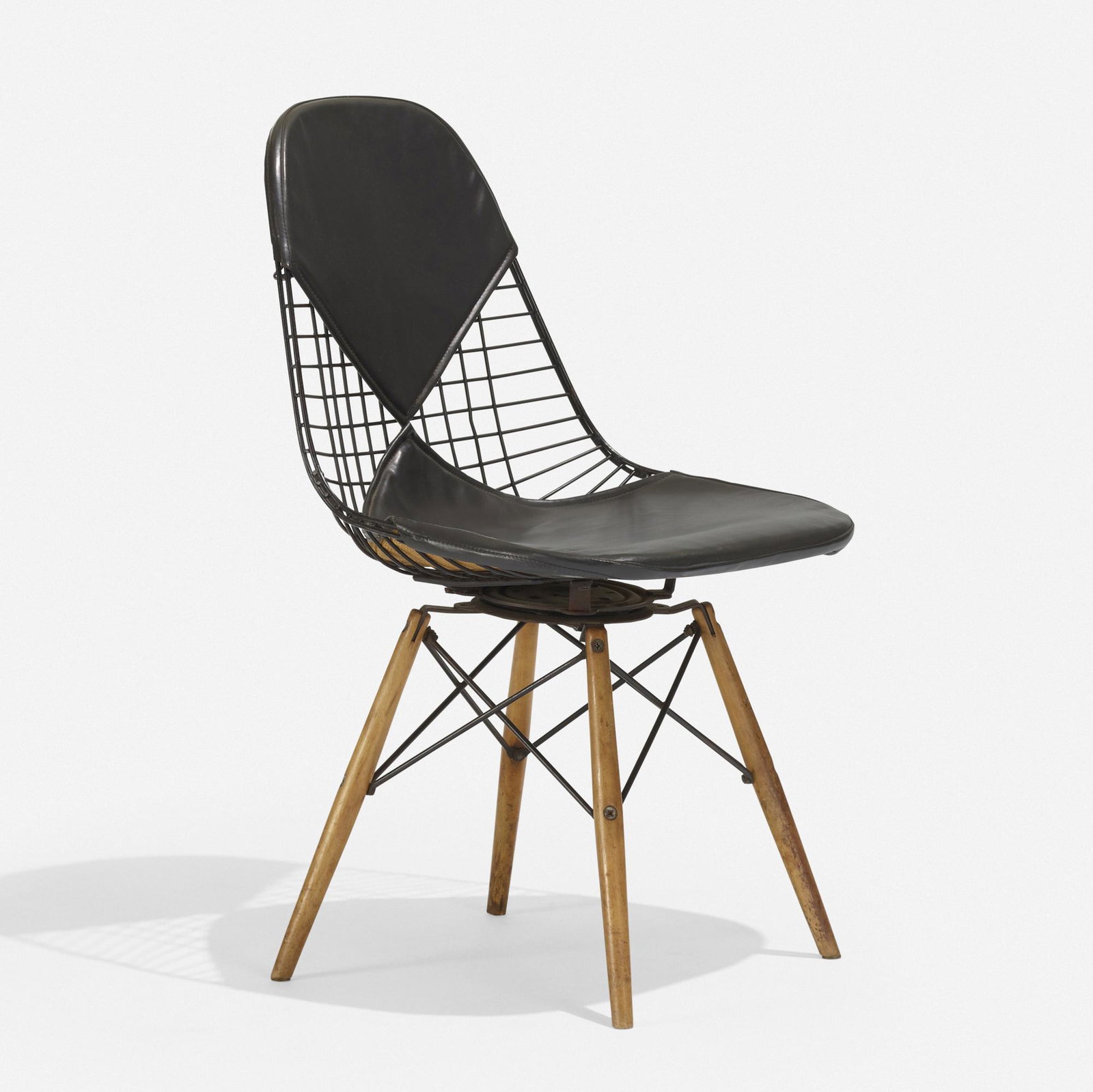 Charles and Ray Eames, PKW-2: Charles and Ray Eames PKW-2 Herman Miller USA, 1951 enameled steel, vinyl, beech 19 w × 21 d × 31.5 h in (48 × 53 × 80 cm) Applied fabric manufacturer's label to unders