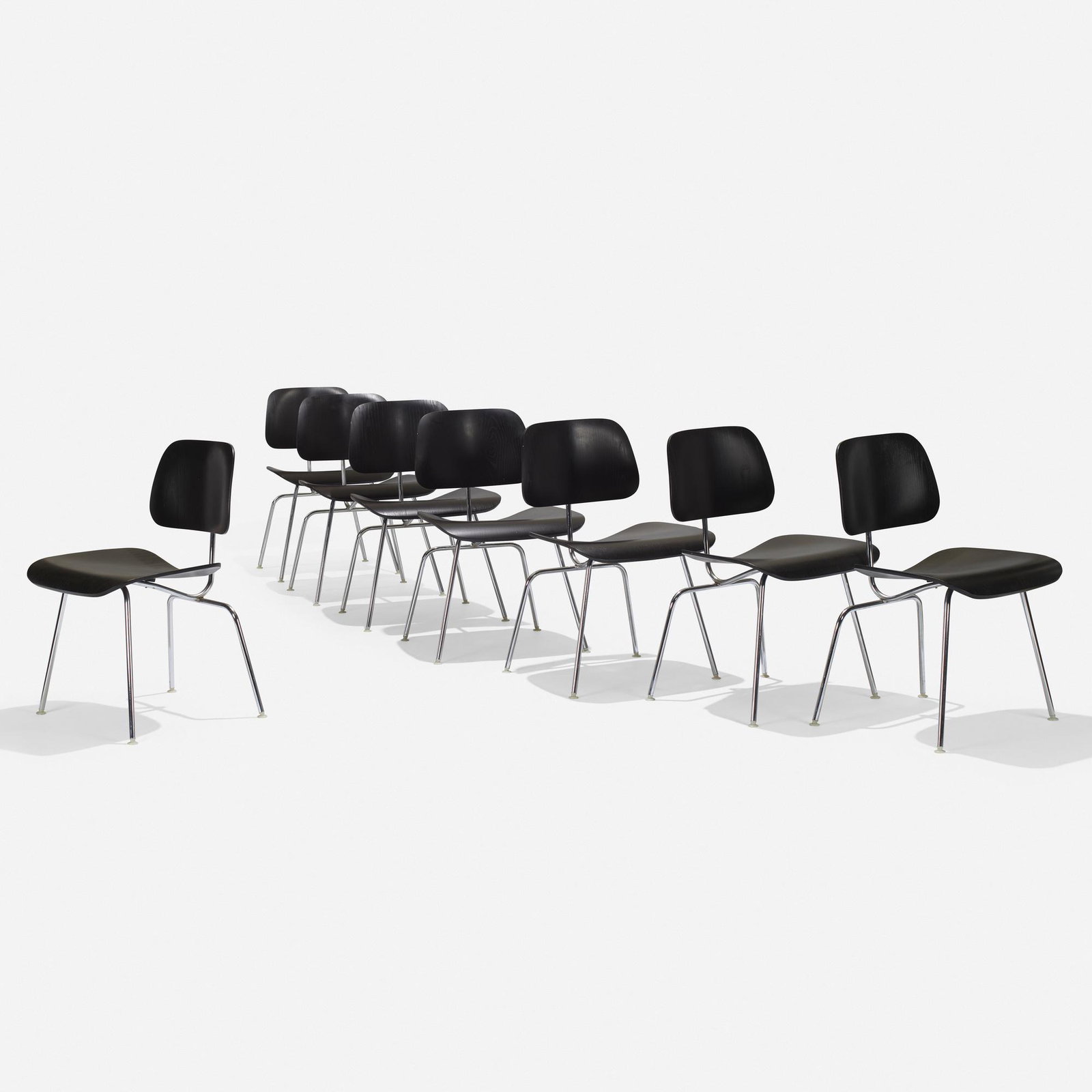 Charles and Ray Eames, DCMs, set of eight: Charles and Ray Eames DCMs, set of eight Herman Miller USA, 1946 / c. 1990 lacquered plywood, chrome-plated steel, rubber 19.5 w × 22 d × 29.5 h in (50 × 56 × 75 cm)