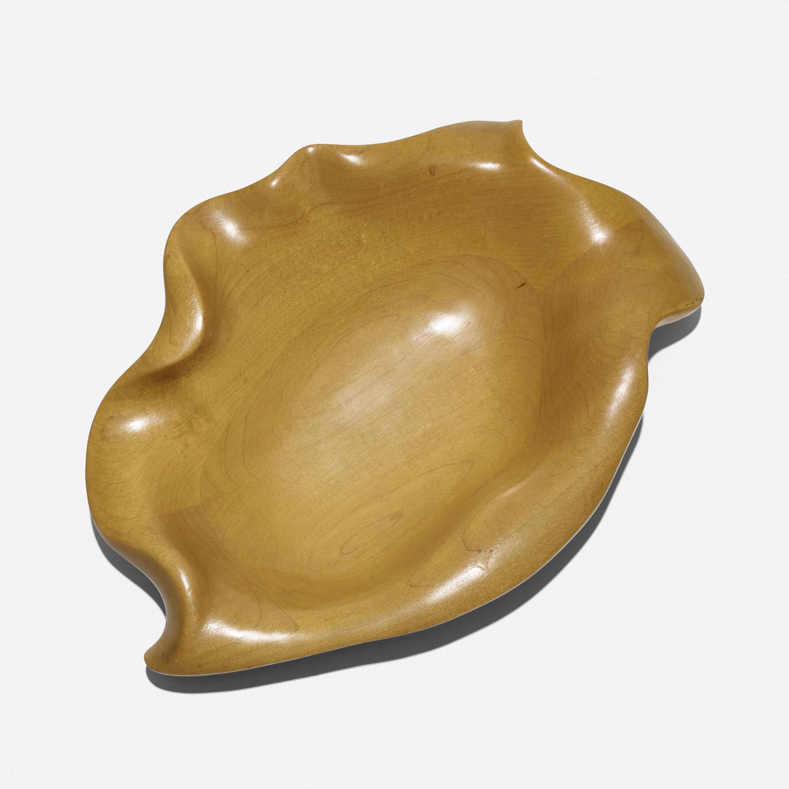 Russel Wright, Oceana bowl: Russel Wright Oceana bowl Klise WoodworkingUSA, c. 1935maple14.25 w × 10.5 d × 2.75 h in (36 × 27 × 7 cm) Partial American Way paper label to underside ‘Desig