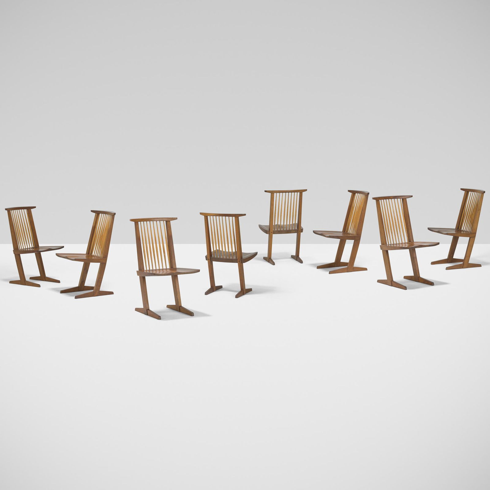George Nakashima, Conoid dining chairs, set of eight: George Nakashima Conoid dining chairs, set of eight USA, 1970American black walnut, hickory20 w × 23 d × 35 h in (51 × 58 × 89 cm) Signed with client name to underside of