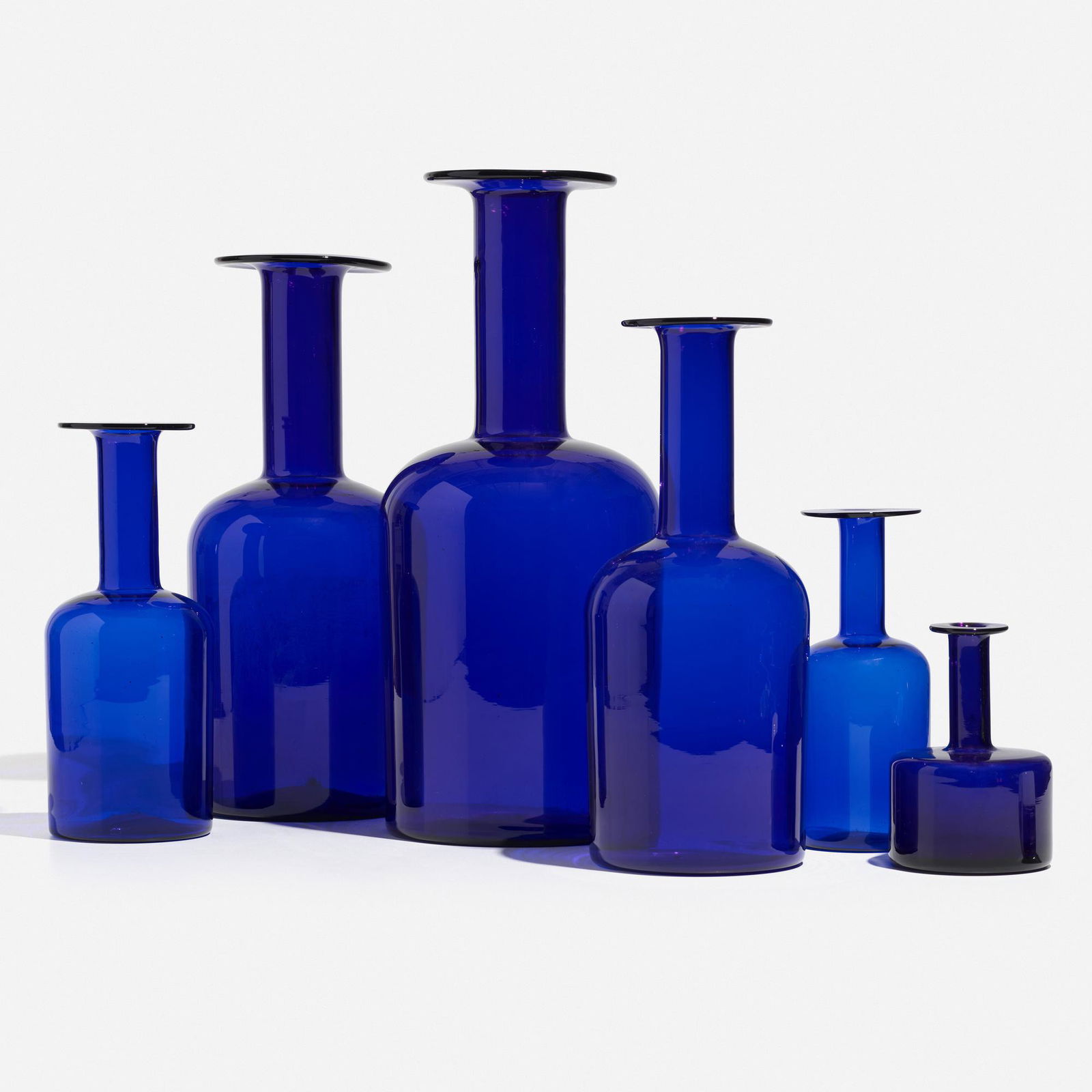 Otto Brauer, Gulvvase, collection of six: Otto Brauer Gulvvase, collection of six Kastrup-HolmegaardDenmark, 1962glass8 dia × 19 h in (20 × 48 cm) Smallest example measures 6.25 inches in height. Sold with glass display