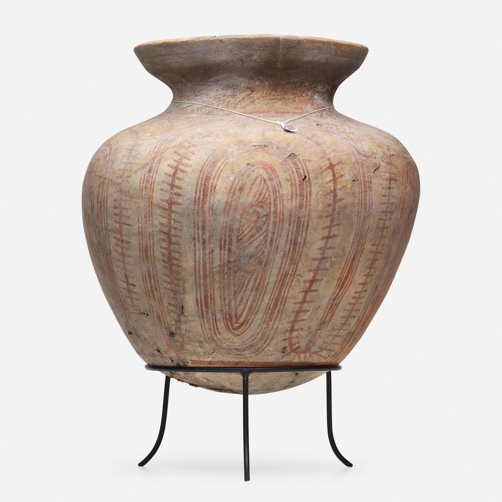 Ban Chiang Style, vessel: Ban Chiang Style vessel earthenware with buff slip and red oxide decoration17 h × 15 dia in (43 × 38 cm) Sold with stand. Provenance: Stefaan Grusenmeyer | The Mar Silver Collec