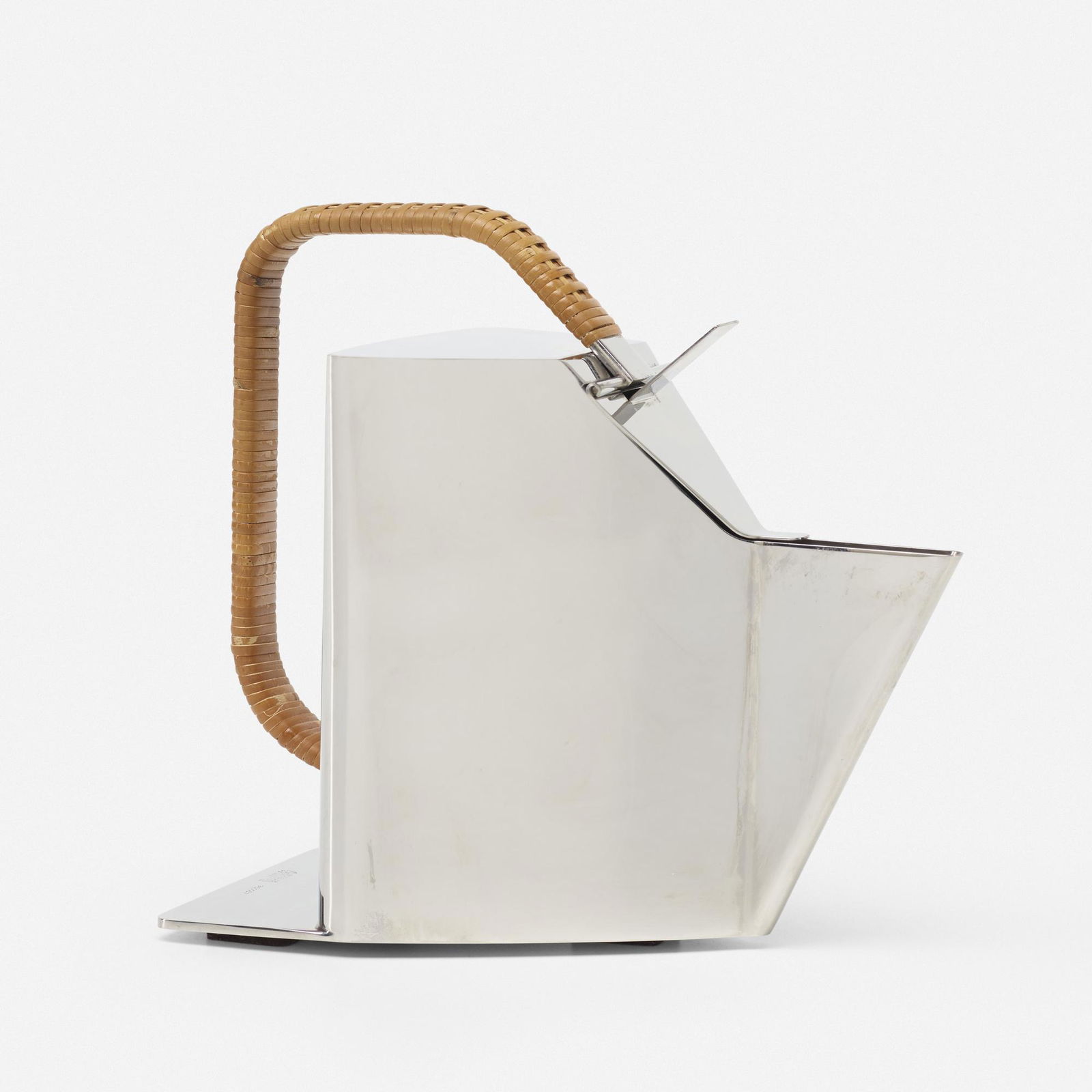 Richard Sapper, Bandung teapot: Richard Sapper Bandung teapot AlessiGermany / Italy, 1992polished stainless steel, cane8 h × 8.5 w × 4.75 d in (20 × 22 × 12 cm) Impressed manufacturer's mark to low