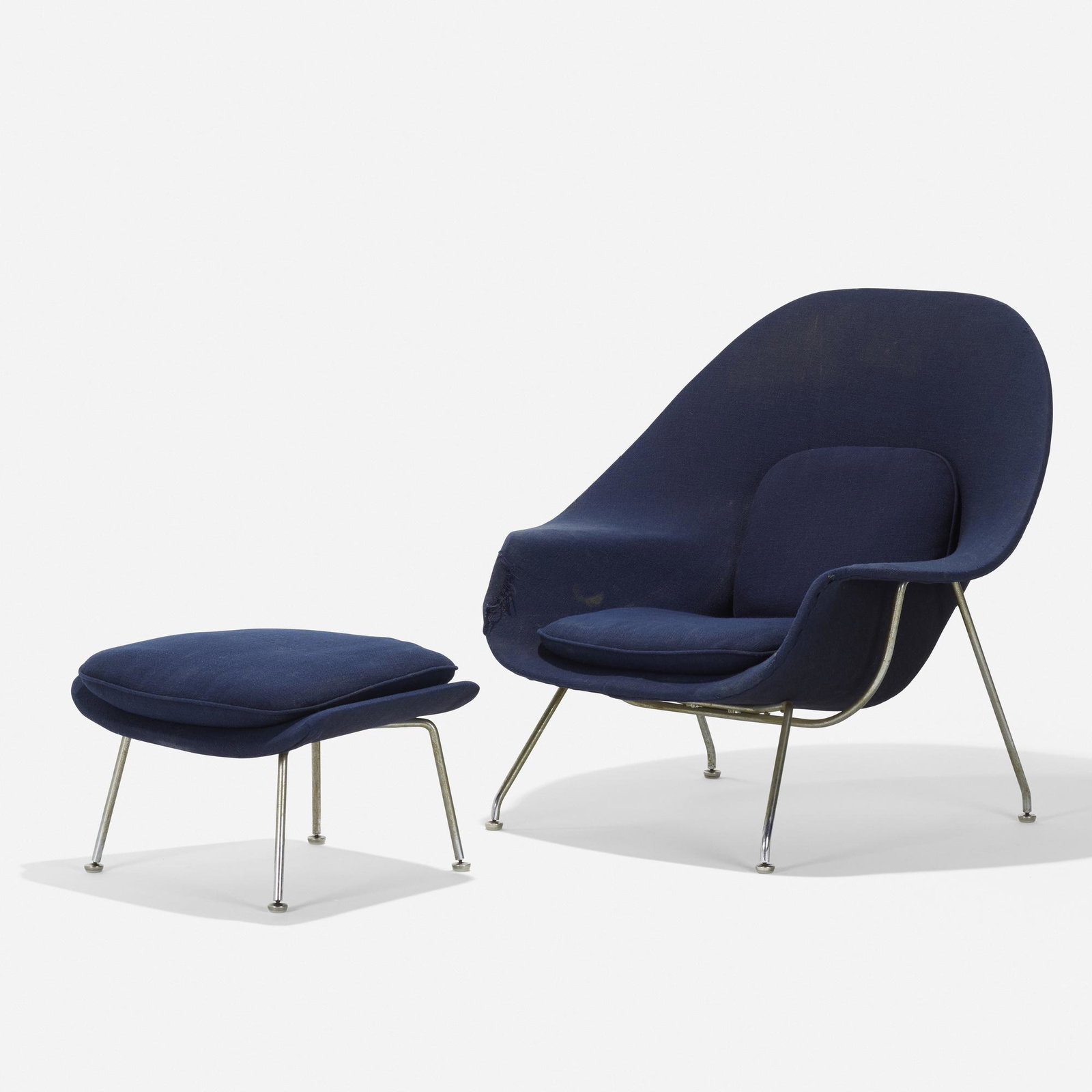 Eero Saarinen, Womb chair and ottoman: Eero Saarinen Womb chair and ottoman Knoll Associates USA, 1946 chrome-plated steel, wool upholstery 36.25 h × 39 w × 30.25 d in (92 × 99 × 77 cm) Ottoman measures: 15